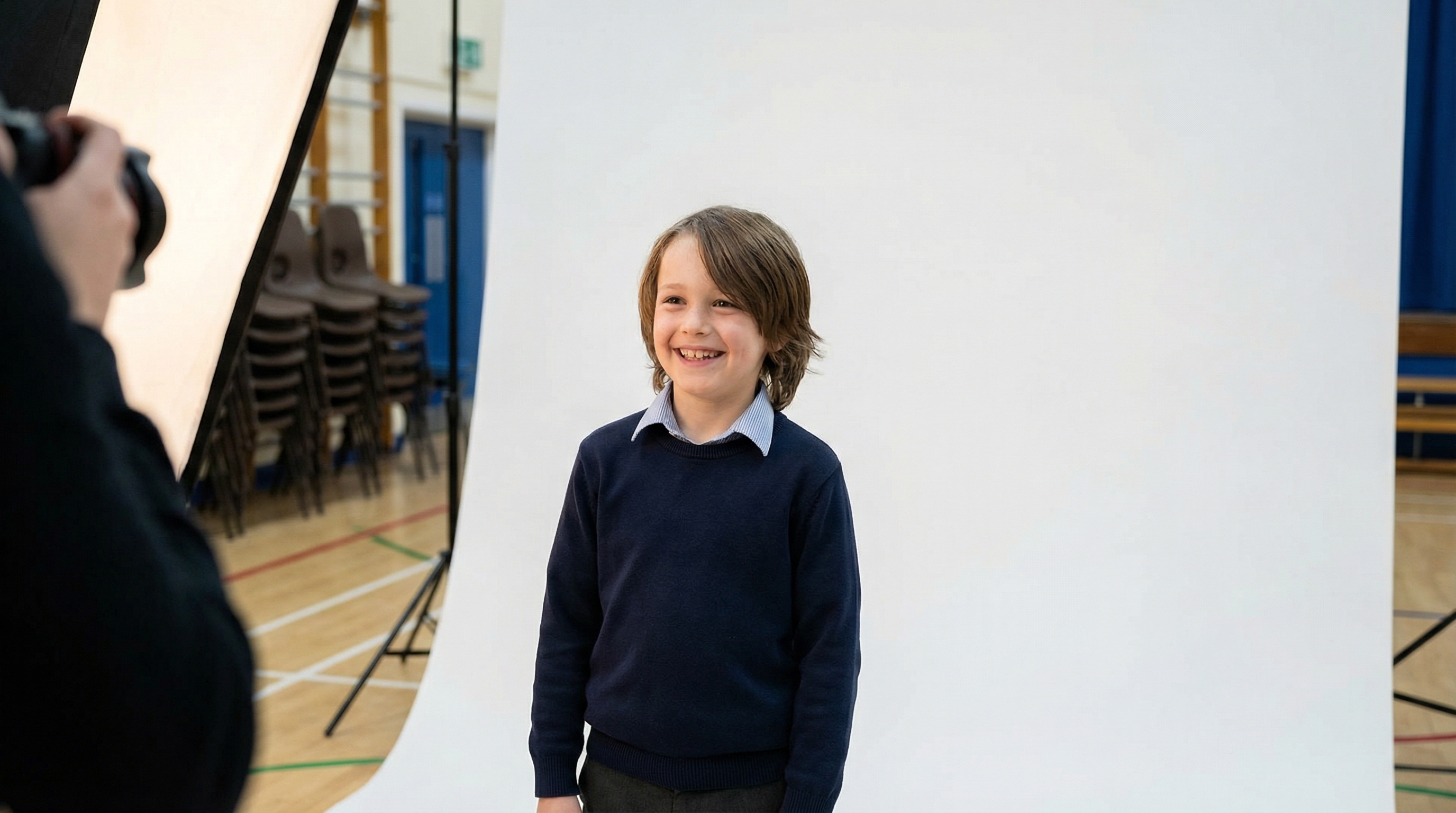 Student being photographed during school picture day