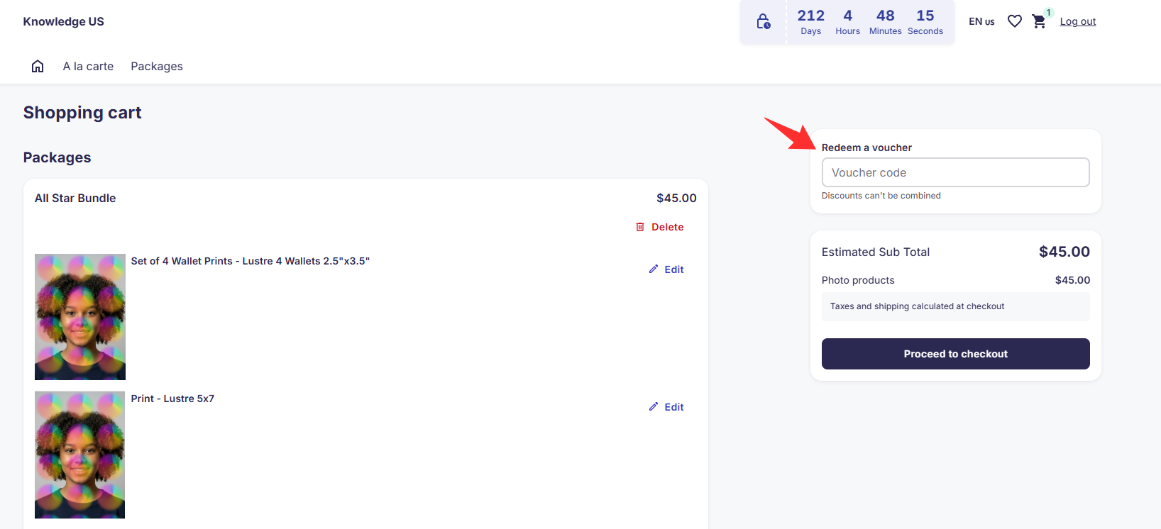 GotPhoto desktop shopping cart showing the Redeem a voucher box with a Voucher code field.